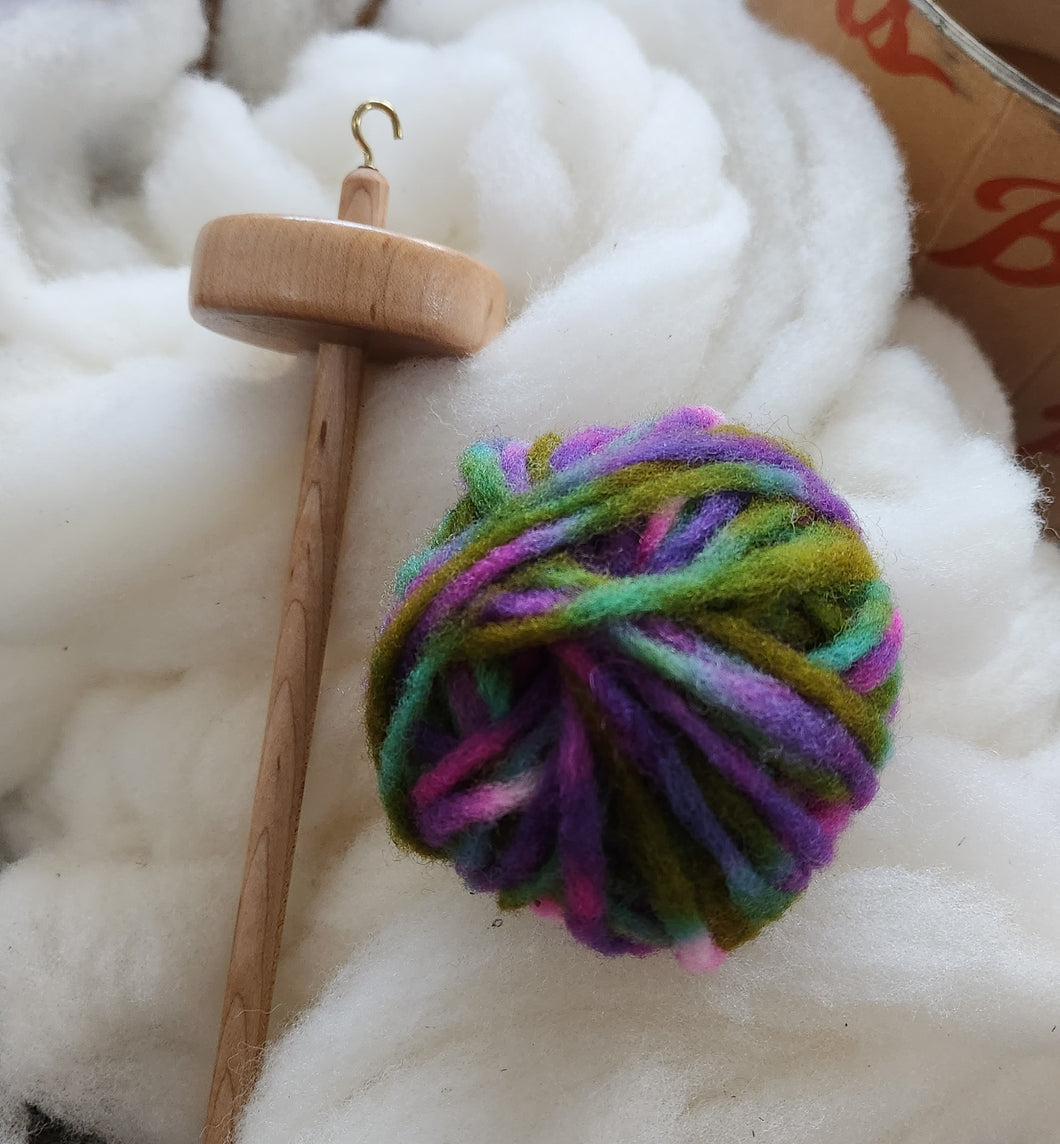 Learn to spin yarn on a drop spindle